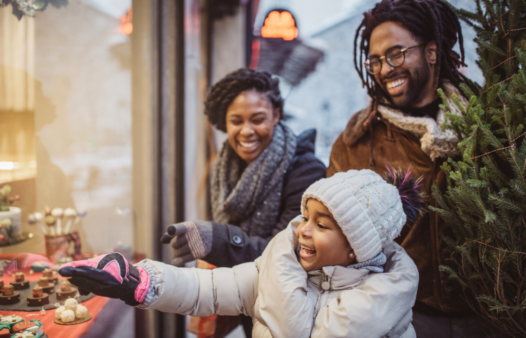 Young family shopping for Small Business Saturday.